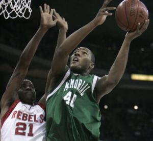 wiaa1-22-mjs-wiaa1-22-3 Jeronne Maymon puts up a rebound shot over Racine Horlick's Jamil Wilson. Joe Koshollek, Milwakee Jounral Sentinel. Click Imgae for more.